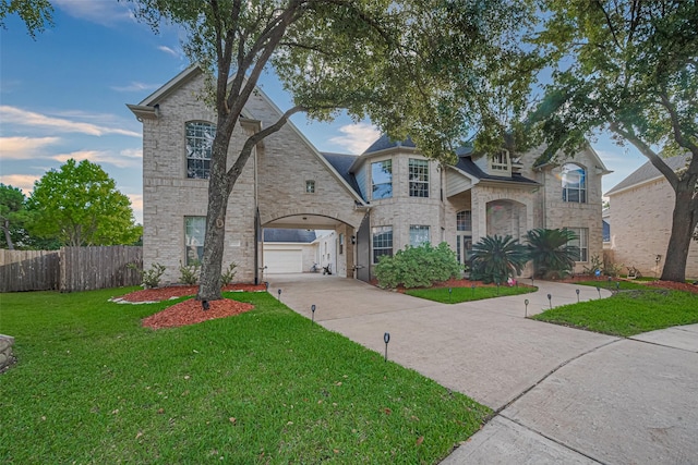7207 Alder Springs Ct, Katy, TX 77494 - french country style house with driveway, brick siding, and stone siding