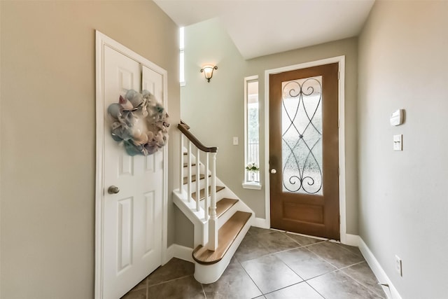 1513 Nagle St, Houston, TX 77003 - entrance foyer featuring tile patterned flooring and stairs