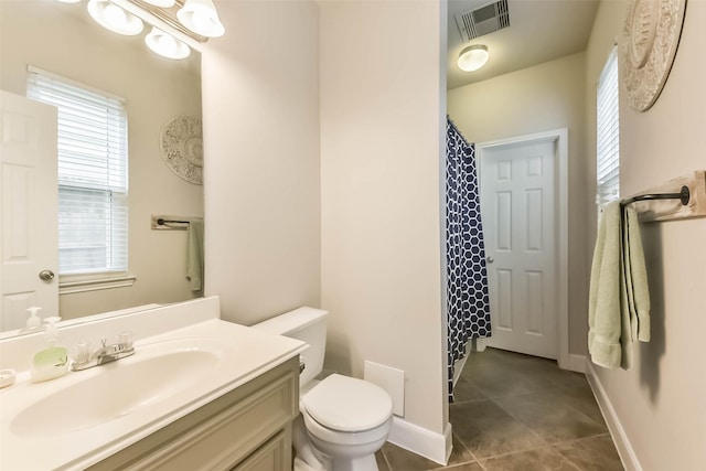 1513 Nagle St, Houston, TX 77003 - full bathroom with vanity, tile patterned flooring, and a shower with shower curtain
