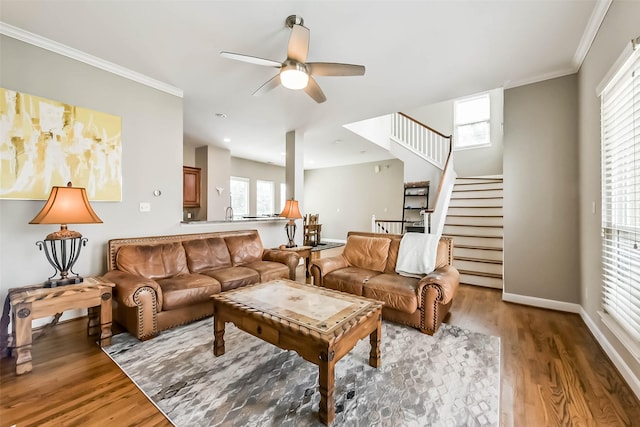 1513 Nagle St, Houston, TX 77003 - living area with a ceiling fan, wood finished floors, ornamental molding, and stairway