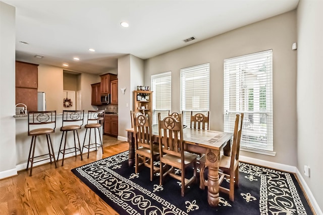 1513 Nagle St, Houston, TX 77003 - dining space featuring light wood-type flooring and recessed lighting