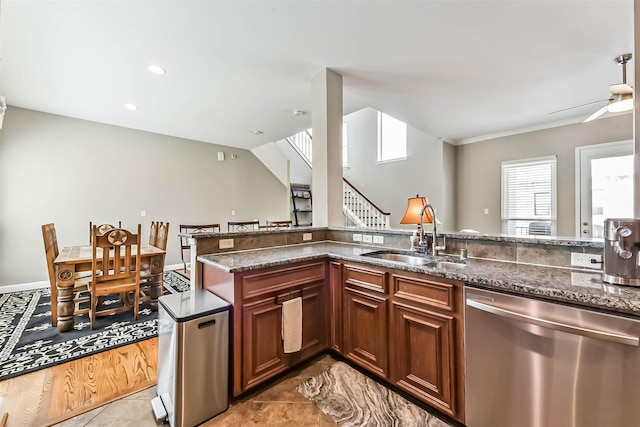 1513 Nagle St, Houston, TX 77003 - kitchen featuring dishwasher, dark stone countertops, ceiling fan, recessed lighting, and light tile patterned floors