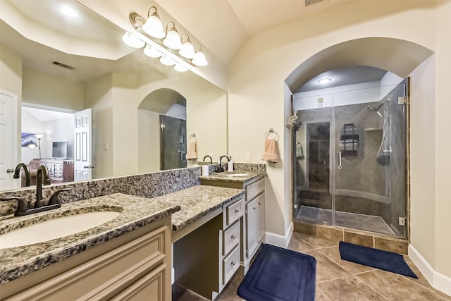 1513 Nagle St, Houston, TX 77003 - bathroom with double vanity, a stall shower, and tile patterned floors