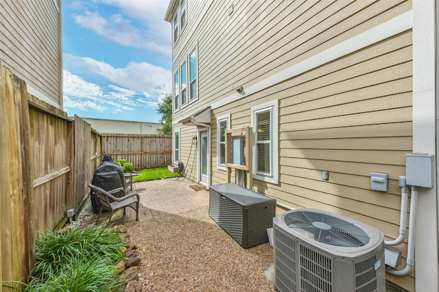 1513 Nagle St, Houston, TX 77003 - fenced backyard with a patio and a grill