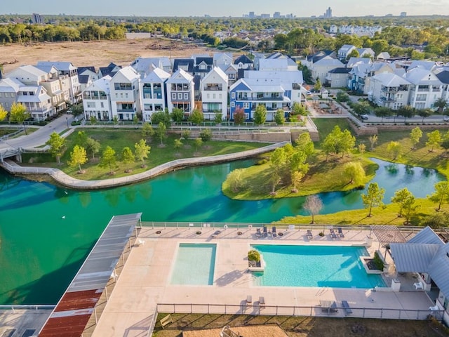 8711 Park Kolbe Ln, Houston, TX 77080 - aerial view of residential area with a pool and a large body of water