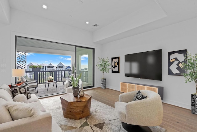 8711 Park Kolbe Ln, Houston, TX 77080 - living area with wood finished floors, baseboards, and recessed lighting
