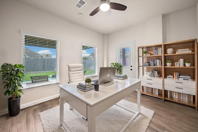 1111 White Winter Ct, Richmond, TX 77406 - office space featuring a ceiling fan, wood finished floors, and baseboards