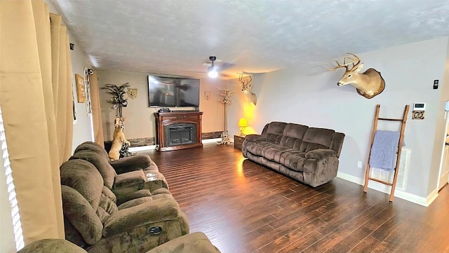18042 Noble Forest Dr, Humble, TX 77346 - living area featuring a fireplace and wood finished floors