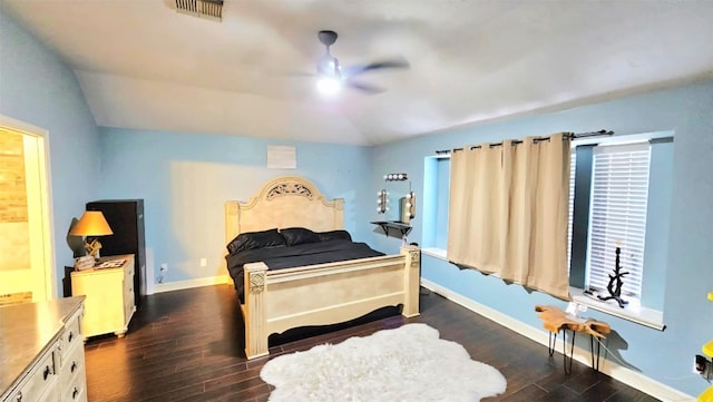 18042 Noble Forest Dr, Humble, TX 77346 - bedroom with dark wood-type flooring, vaulted ceiling, and a ceiling fan