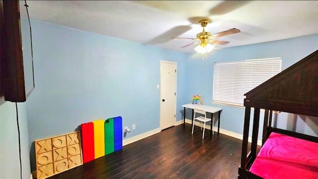 18042 Noble Forest Dr, Humble, TX 77346 - bedroom with wood-type flooring, baseboards, and a ceiling fan
