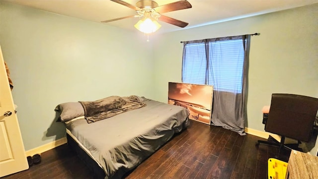 18042 Noble Forest Dr, Humble, TX 77346 - bedroom with baseboards, wood finished floors, and ceiling fan
