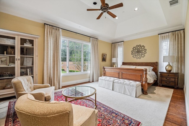 5418 Braeburn Dr, Bellaire, TX 77401 - bedroom with a raised ceiling, wood finished floors, baseboards, a ceiling fan, and recessed lighting