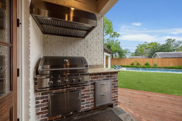 5418 Braeburn Dr, Bellaire, TX 77401 - view of patio featuring a deck