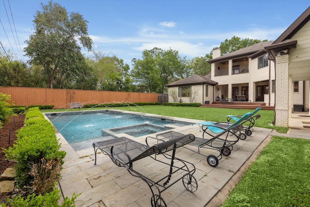 5418 Braeburn Dr, Bellaire, TX 77401 - view of swimming pool with a patio area and a pool with connected hot tub