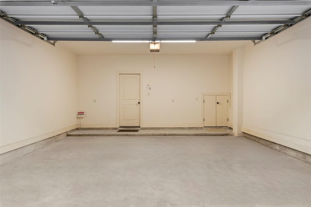 2403 Commonwealth St, Houston, TX 77006 - garage featuring a garage door opener