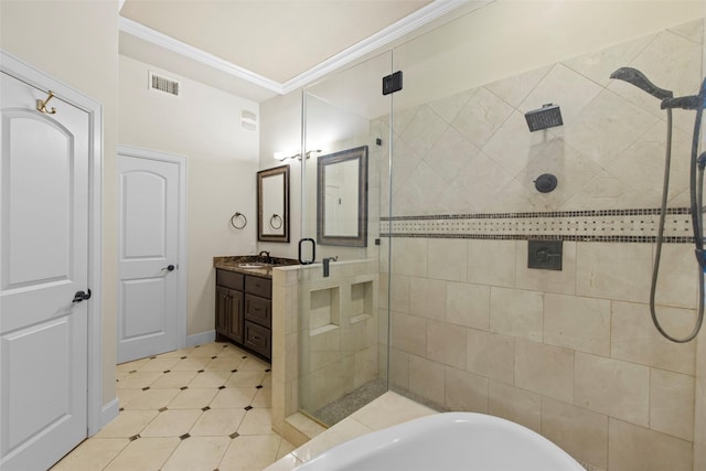 2403 Commonwealth St, Houston, TX 77006 - bathroom featuring crown molding, a shower stall, vanity, tile patterned flooring, and a tub to relax in