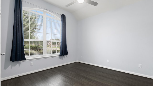 18010 Wagstaff Way, Richmond, TX 77407 - spare room with ceiling fan, healthy amount of natural light, lofted ceiling, dark wood-style flooring, and baseboards