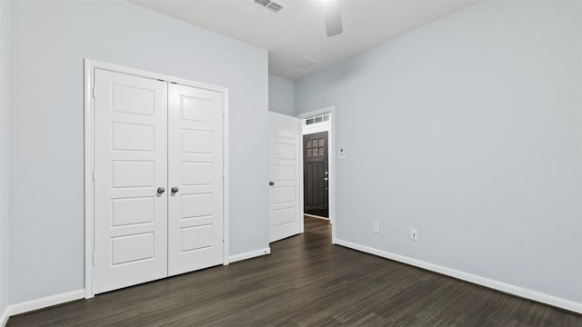 18010 Wagstaff Way, Richmond, TX 77407 - unfurnished bedroom featuring dark wood finished floors and baseboards