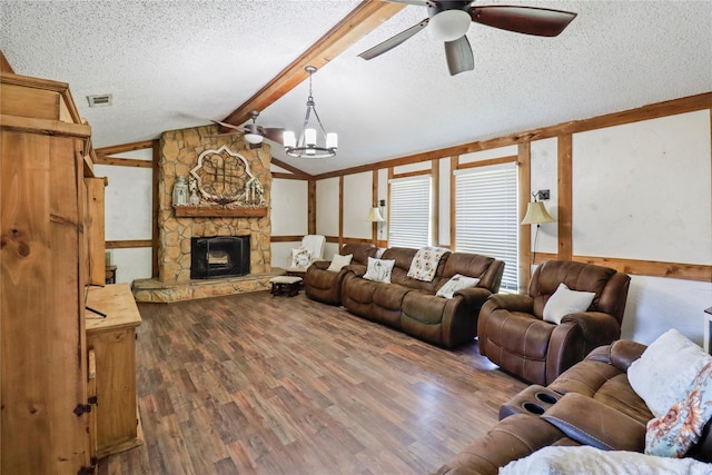 104 Meadowlark Ln, Angleton, TX 77515 - living area with a ceiling fan, a chandelier, wood finished floors, a textured ceiling, and a fireplace