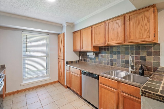 104 Meadowlark Ln, Angleton, TX 77515 - kitchen featuring appliances with stainless steel finishes, a sink, crown molding, decorative backsplash, and light tile patterned flooring