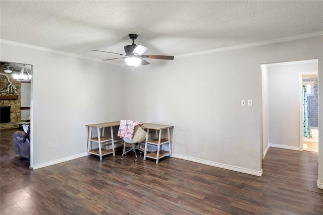 104 Meadowlark Ln, Angleton, TX 77515 - office space featuring ceiling fan, wood finished floors, crown molding, a textured ceiling, and a stone fireplace