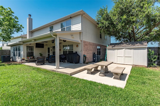 3803 Shiloh Park Ct, Friendswood, TX 77546 - back of house with a patio area, a chimney, ceiling fan, and brick siding