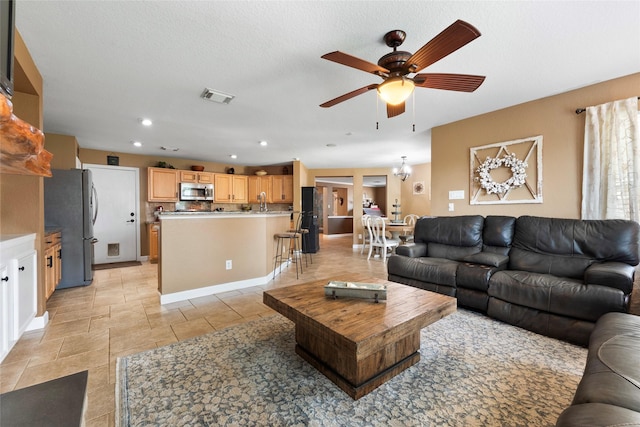 3803 Shiloh Park Ct, Friendswood, TX 77546 - living room featuring a ceiling fan and recessed lighting