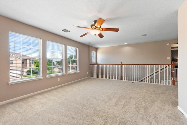 3803 Shiloh Park Ct, Friendswood, TX 77546 - spare room featuring carpet floors, ceiling fan, and baseboards