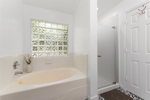 3803 Shiloh Park Ct, Friendswood, TX 77546 - full bathroom featuring a bath and a shower stall