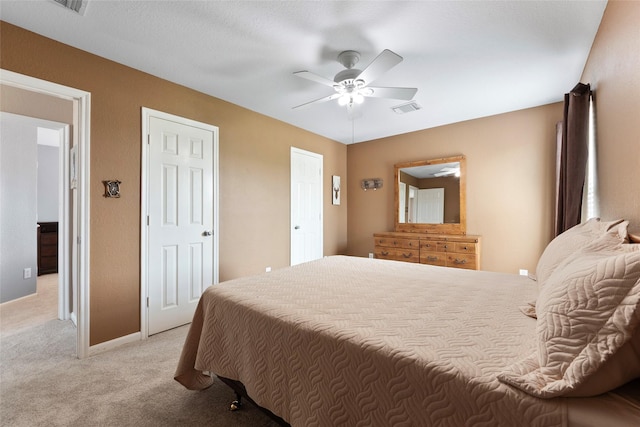 3803 Shiloh Park Ct, Friendswood, TX 77546 - bedroom with light carpet, baseboards, and a ceiling fan