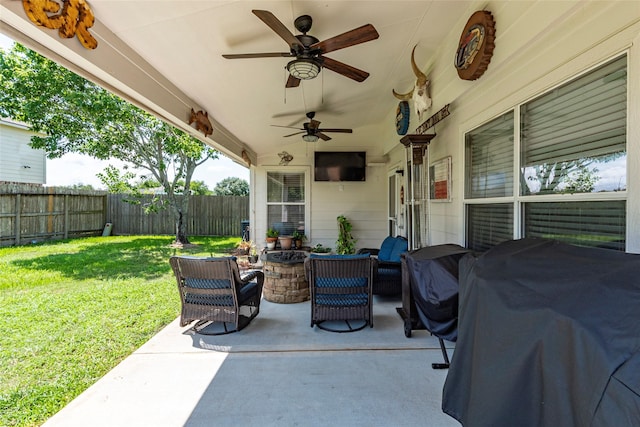 3803 Shiloh Park Ct, Friendswood, TX 77546 - view of patio / terrace featuring ceiling fan, an outdoor living space with a fire pit, and area for grilling