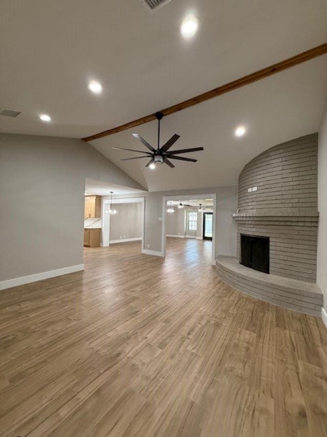 674 Meadowgreen Dr, Port Neches, TX 77651 - unfurnished living room featuring ceiling fan, baseboards, a fireplace, wood finished floors, and recessed lighting