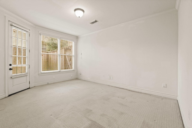 9269 Buffalo Speedway, Houston, TX 77025 - spare room with ornamental molding, light carpet, and baseboards