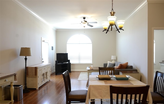 2203 Dorrington St Unit 403, Houston, TX 77030 - dining space with ornamental molding, ceiling fan, dark wood-type flooring, baseboards, and a chandelier