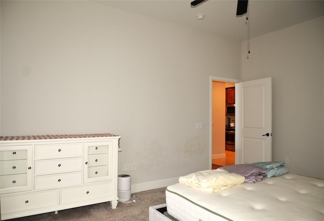 2203 Dorrington St Unit 403, Houston, TX 77030 - bedroom with dark carpet and baseboards