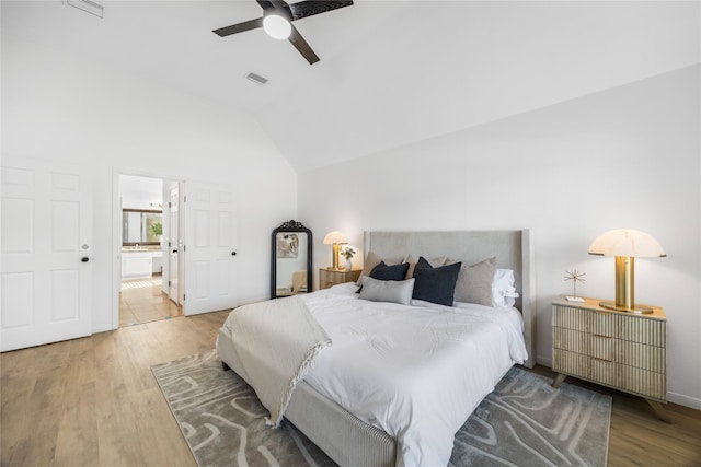 10310 Minturn Ln, Houston, TX 77064 - bedroom with wood finished floors, ensuite bathroom, a ceiling fan, baseboards, and high vaulted ceiling
