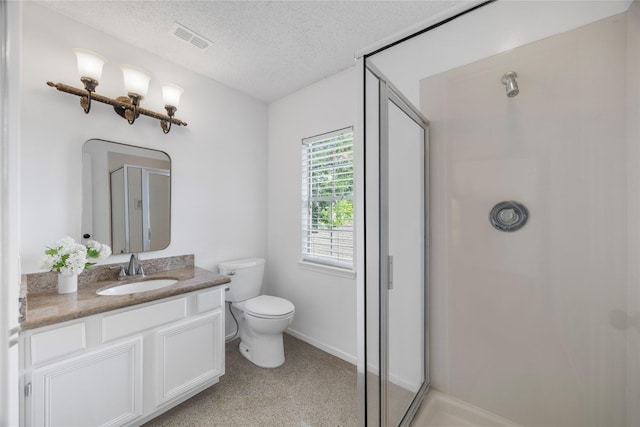 10310 Minturn Ln, Houston, TX 77064 - full bath featuring a stall shower, vanity, toilet, a textured ceiling, and baseboards