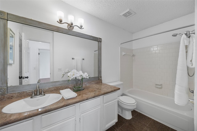 10310 Minturn Ln, Houston, TX 77064 - full bathroom with vanity, toilet, washtub / shower combination, and a textured ceiling