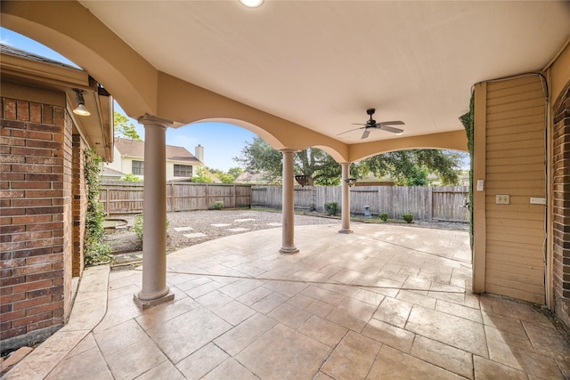 10310 Minturn Ln, Houston, TX 77064 - fenced backyard with a patio area and ceiling fan