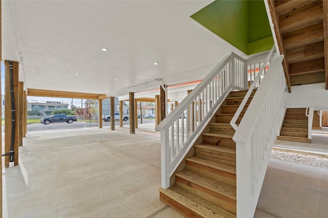 1104 62nd St, Galveston, TX 77551 - stairway featuring recessed lighting