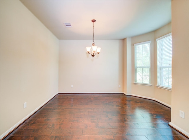 9110 Darby Park Ln, Richmond, TX 77407 - empty room with a chandelier and wood-type flooring