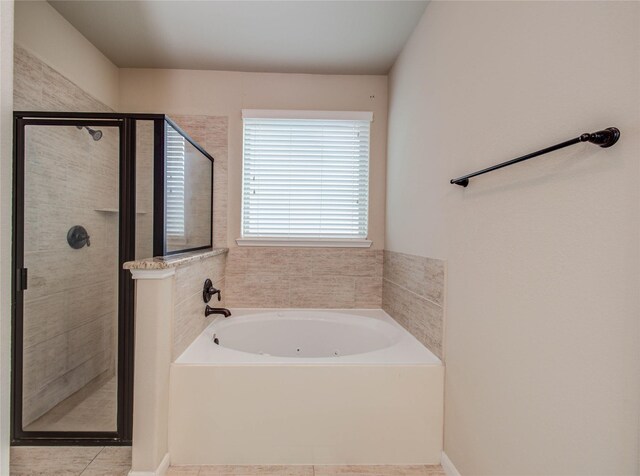 9110 Darby Park Ln, Richmond, TX 77407 - full bath with a bath, a shower stall, and tile patterned flooring