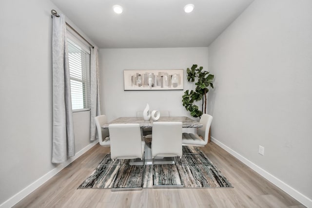 10053 Cloud Mist Dr, Houston, TX 77080 - dining area with light wood finished floors, baseboards, and recessed lighting
