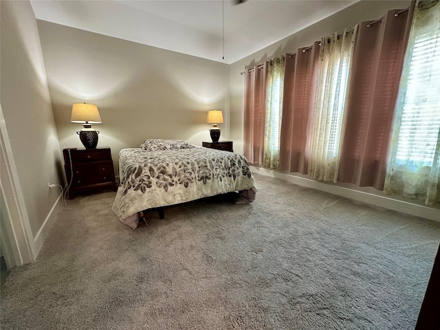 18622 Courteous Way, Cypress, TX 77433 - bedroom featuring multiple windows, carpet, and baseboards