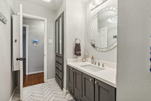 9623 Val Verde St, Houston, TX 77063 - bathroom featuring vanity, brick patterned flooring, and baseboards
