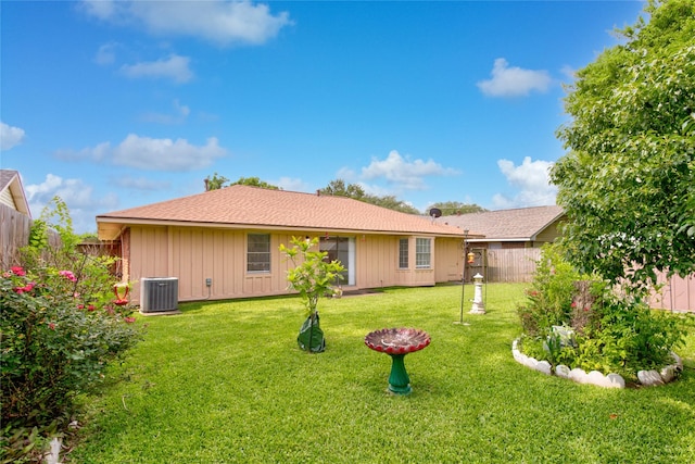 705 Kalmer St, Pasadena, TX 77502 - rear view of house with board and batten siding and central AC unit