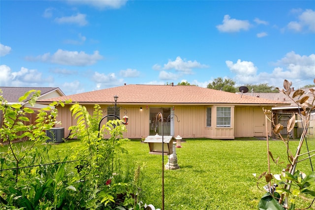 705 Kalmer St, Pasadena, TX 77502 - view of front of home featuring central AC unit, board and batten siding, and a shingled roof