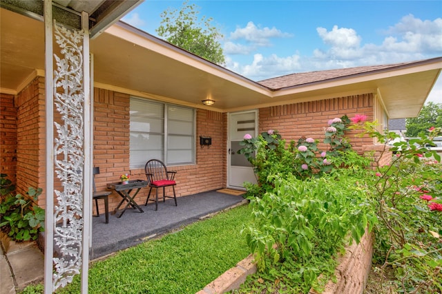 705 Kalmer St, Pasadena, TX 77502 - entrance to property with brick siding and roof with shingles