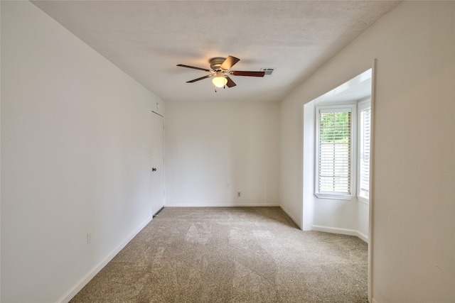 705 Kalmer St, Pasadena, TX 77502 - carpeted spare room with ceiling fan and baseboards
