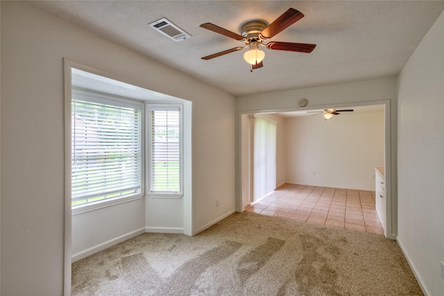 705 Kalmer St, Pasadena, TX 77502 - carpeted empty room with ceiling fan and baseboards